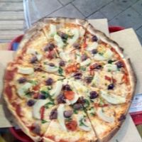 vegan pizza with artichokes, peppers, garlic and kalamata olives at Agvania Pizza in Eilat