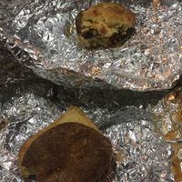 The partially Eatin killer tofu and beginning of not a mc breakfast sandwich  at Sea Salt & Cinnamon in Muncie