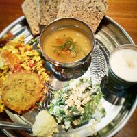 Bread plate with soup, vegan yogourt, humus, potato, salad and crumble tofu. Yummy! at Niceness in Nago