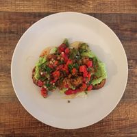 Avocado on sourdough with sweet pepper and chilli relish and marinated tempeh chunks   at Lovely Pear in Sheffield