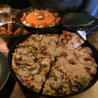Half & Half Vegan pizza:
Left side - Vegetarian Supreme.
Right side - Veggie Meat Feast.
Plain Salad and Spicy Soya Sticks. at Mr Singh's in Wolverhampton