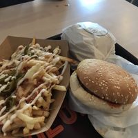 Dirty fries covered in vegan mayo, cheese, bacon bits and jalapeños  at Greazy Vegan in Cardiff