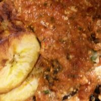 Takeaway Aubergine Parmigiana with plantain. at Plantbase Cafe in South West London