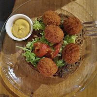 Vegan kroketjes on bread at Wolf Hotel Kitchen & Bar in Alkmaar