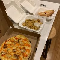 Buffalo pizza, fried pickles, and chicken parm sandwich. Greasy greasy at Bourbon & Branch in Philadelphia