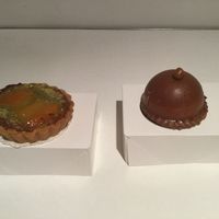 Pistachio/pear tart and Hazelnut, pear mousse and biscuit inside "The Dome" at Jo and Nana Cakes in Paris