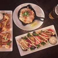 Fried green tomatoes, elote, and cauliflower wings  at Beelman's in Los Angeles