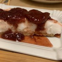 Coconut cheesecake with plum preserve topping    at Peas in Athens