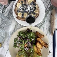eggs bennedict and almond banana french toast  at Hello 123 in Toronto