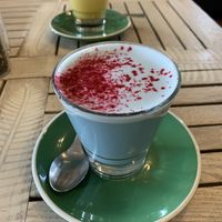 Blue Latte with a Turmeric Latte in the background  at Nature Cafe/Bar in Frankston
