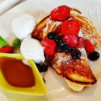 Pancakes and a paper on a Sunday morning..  at Nature Cafe/Bar in Frankston