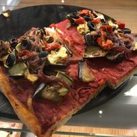 Vegan pizza at Nabucco Obrador Vegetaria in Barcelona