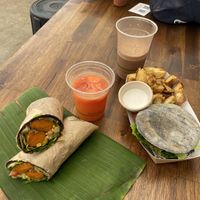 Mexican wrap and burger with air fried chips. Juice and iced chocolate to wash it down  at Fruibies in Kuranda