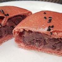 Sweet bun (red rice flavor) filled with cream and red bean paste.
 at yummyyomil in Seoul