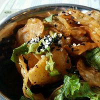 Great combination of potato chips, greens and sauce. at Pirate's Bone Burgers - Crossroads in Kansas City