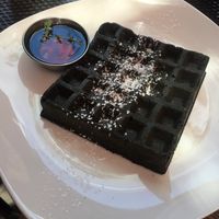 Activated charcoal waffle with chocolate chips at Pirate's Bone Burgers - Crossroads in Kansas City