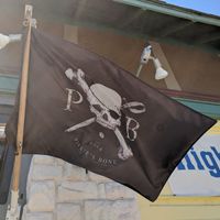 Flags out front at Pirate's Bone Burgers - Crossroads in Kansas City