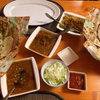 yellow pea curry, two kind of indian bread one with fresh minth and second with fresh garlic, curry rice with fried onion at Royal Kashmir in Bratislava