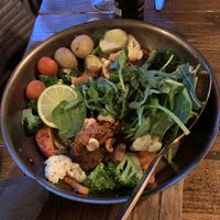 The vegan main - carrot and chickpea fritter thing in a pan. Really lovely   at Messinn in Reykjavik