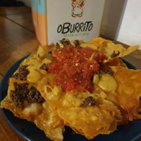 Nachos were tiny with minimal topping but tasty chips at O Burrito in Porto
