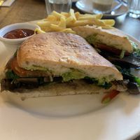 Vegan Delight - sauerkraut, avo, tomato, mushroom and spinach on Turkish bread with a side of fries. Could’ve used some vegan mayo or aioli but was fine for the price.   at Saff's Cafe  in Castlemaine