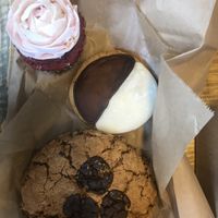 Red velvet cupcake, black and white cookie, and chocolate chip breakfast cookie at Red Barn Bakery in Irvington