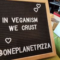 stall at VegfestUK, London at One Planet Pizza in Norwich