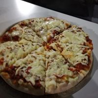 Pizza with vegan cheese. at Cafe Cafe in Eilat