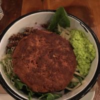 beyond meat burger on a salad at Bareburger in Astoria