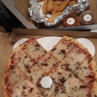 Vegan pizza with sausage & 1 pound of nuggets at Fresh Brothers  in Marina Del Rey