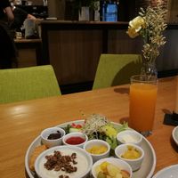 Vegan breakfast with chocolate hazelnut spread, selfmade jam, selfmade vegan spread (curry), soy jogurt, salad at Hier & Jetzt in Soest