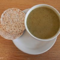 Courgette and spinach soup with rice cakes at The Garden Cafe  in Cambridge