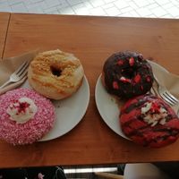 The place is so cozy and sweet. I went specially for the donuts and it's worthy. Fresh, fluffy and different tastes. The salty dishes were looking tasty too, but I didn't try. The  at Vegan Food & Sweet Bar in Brno