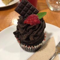 Cute little vegan muffin with little chocolate on top!  at Vegan Food & Sweet Bar in Brno