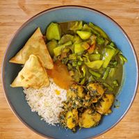 Adrakhi Sobuj Sabzi with sides at Horsham Tandoori in Horsham