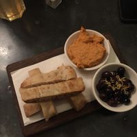 Starter - Bread w hummus & olives at Bill's in Guildford