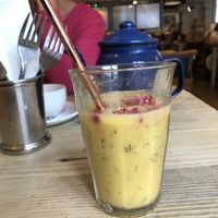 Delicious tropical smoothie 🍌🍍🥥 at Bill's in Guildford