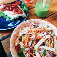 Papaya salad, egg & bacon burger, green smoothie, watermelon juice. at Chookie's Beer Garden in Ninh Binh