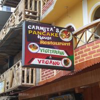 Sign outside of restaurant at Carmita's Pancake House Restaurant in Montanita