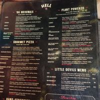 One side of the menu at Hell Pizza in Auckland