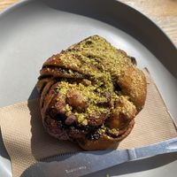 Cinnamon roll with pistachio   at Orchard Lane Coffee House in Folkestone