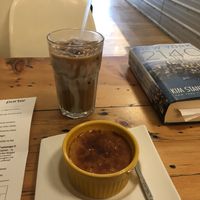 Vegan passion fruit creme brûlée and Vietnamese iced coffee. at Craque de Creme in Toronto