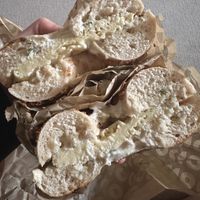 Onion bagel with scallion cream cheese and just egg  at Rise Bagel Co. in Minneapolis