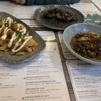 Patatas bravas , lentil stew , mushrooms in spinach cream  at Ambiente Tapas in Hull