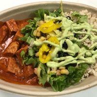 Mmm Butter Chick'n Buddha Bowl with Brown Rice, Greens, black beans and a drizzle of sauces!  at Vegorama in Ypsilanti