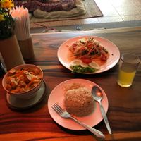 Papaya salad, green curry and kombucha  at Ethos in Bangkok