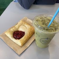 Pineapple matcha latte and cherry cheese Danish  at Batter & Crumbs in Philadelphia