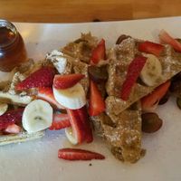 Waffles with fresh fruit and maple syrup at The Red Dot Kitchen in Wurtsboro