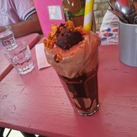 Limited edition Brownie Honeycomb Shake: honeycomb ice cream, homemade honeycomb pieces, 1 slice of brownie topped with homemade chocolate sauce and even more homemade honeycomb. at DoppleGanger in Cambridge