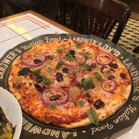 Vegan Kalamata Olives & Onions Pizza at  Cafe Landwer in Vaughan